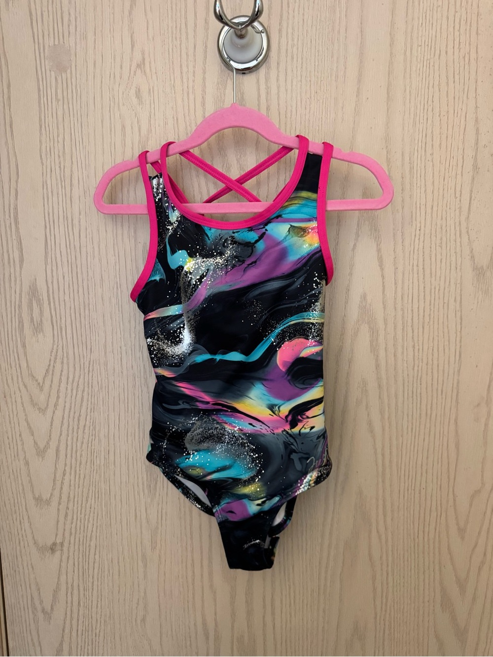 Justice Black leotard with Neon Swirl and Pink Trim